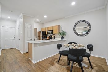 Dining space with breakfast bar and modern seating